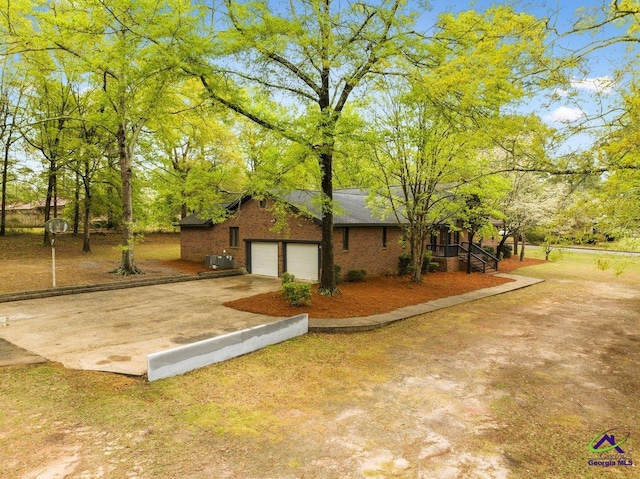 exterior space featuring a garage