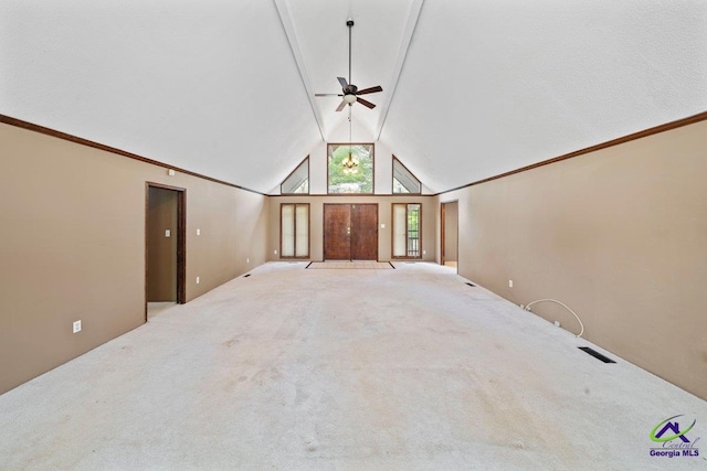 unfurnished living room featuring ceiling fan, light carpet, and high vaulted ceiling