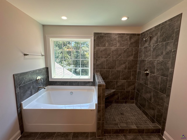 bathroom with plus walk in shower and tile patterned floors