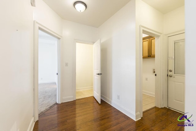 hall featuring dark hardwood / wood-style floors