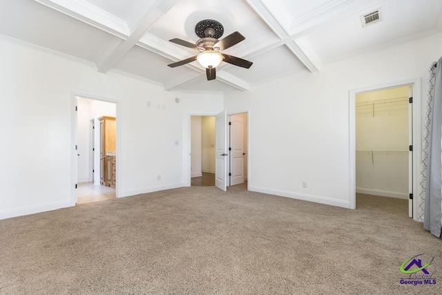 unfurnished bedroom featuring ceiling fan, light carpet, beam ceiling, and coffered ceiling