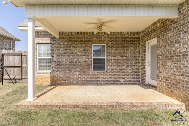 view of patio / terrace featuring ceiling fan