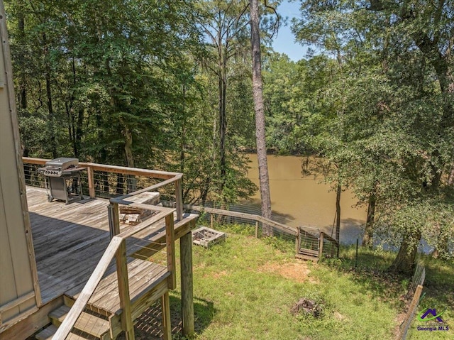 311 Riverside Dr, Hawkinsville, GA 31036 - view of yard featuring a wooden deck
