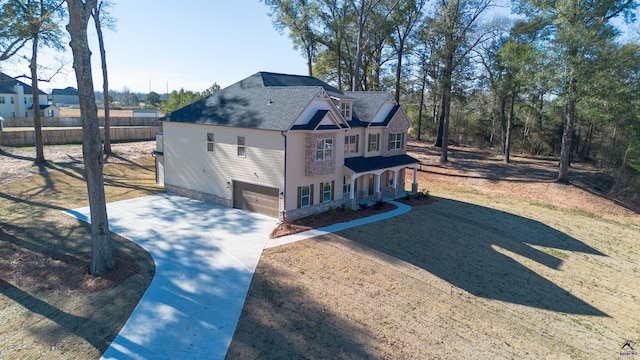 view of side of property with a garage