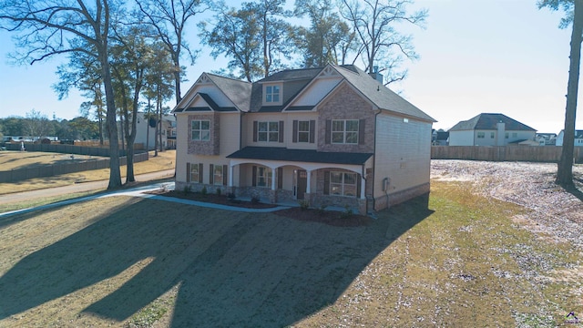 view of front of home with a front yard