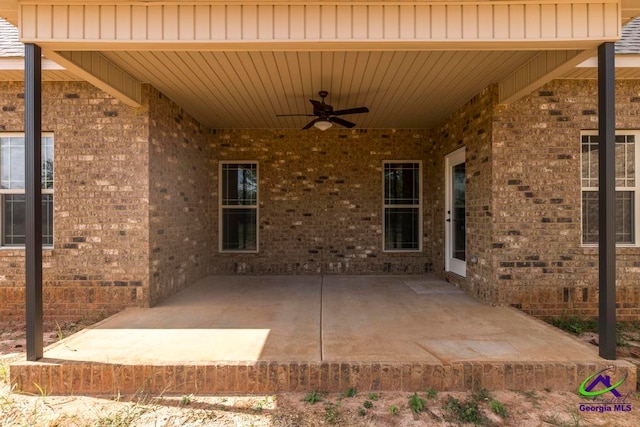 view of patio featuring ceiling fan