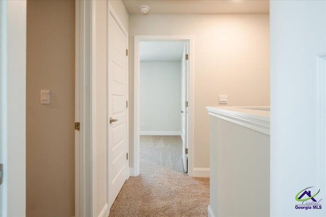 219 Carsons Walk, Macon, GA 31216 - hallway with light colored carpet and baseboards