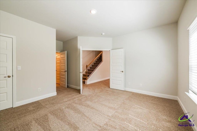 219 Carsons Walk, Macon, GA 31216 - unfurnished room featuring recessed lighting, baseboards, a wealth of natural light, and carpet floors