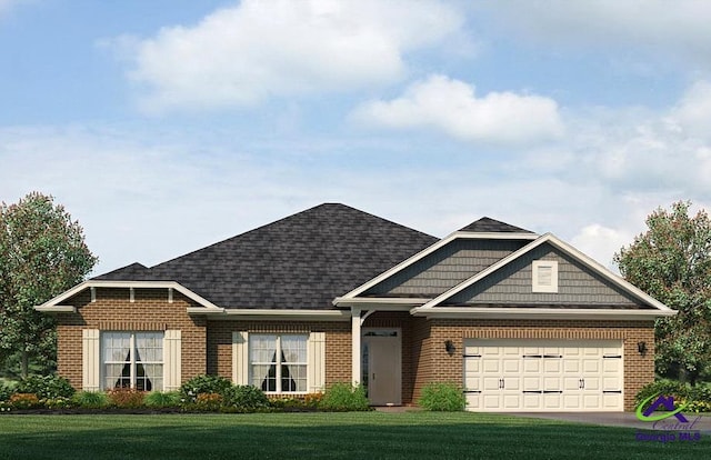 view of front of property with a garage and a front yard