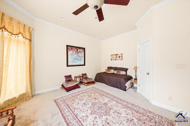 carpeted bedroom featuring ceiling fan and ornamental molding