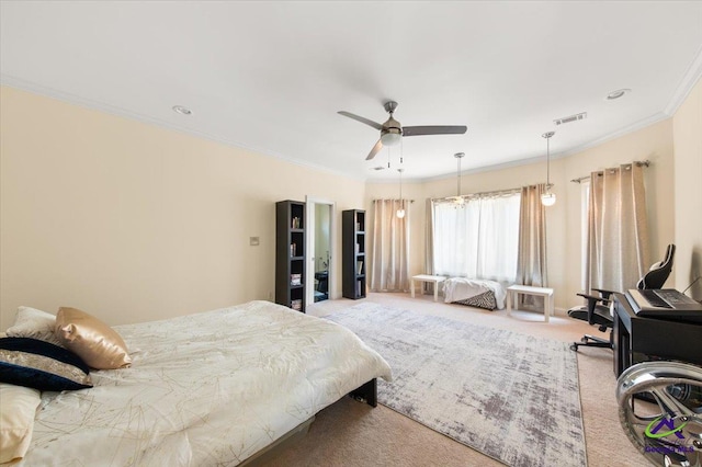 carpeted bedroom with crown molding and ceiling fan