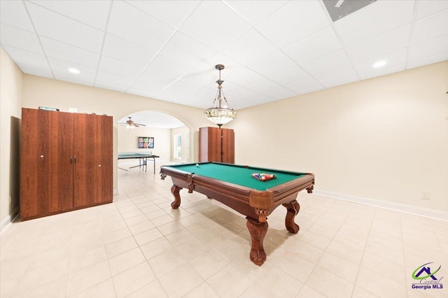 recreation room featuring tile flooring, ceiling fan, pool table, and a paneled ceiling