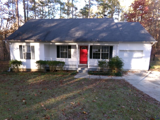 ranch-style house with a garage, concrete driveway, a porch, and a front yard