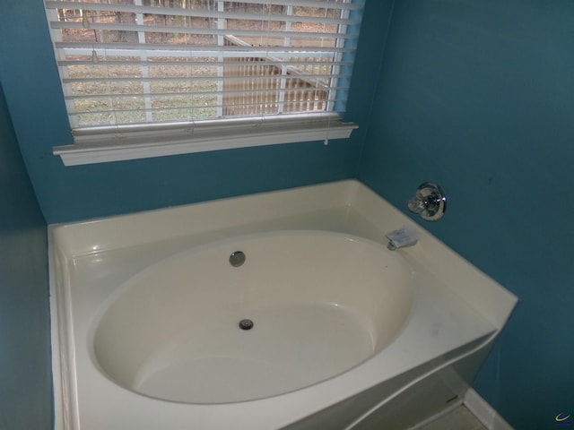 bathroom featuring a garden tub