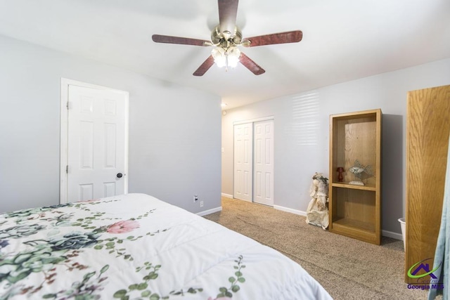 bedroom featuring ceiling fan, a closet, and carpet floors