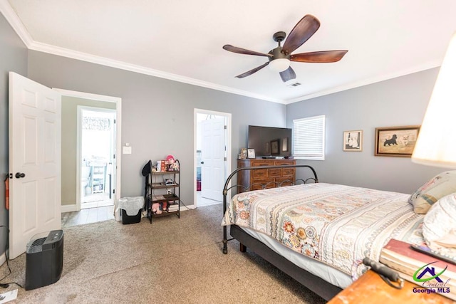 bedroom featuring ceiling fan, carpet floors, multiple windows, and ornamental molding