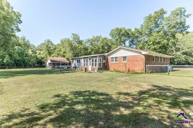 exterior space with a yard