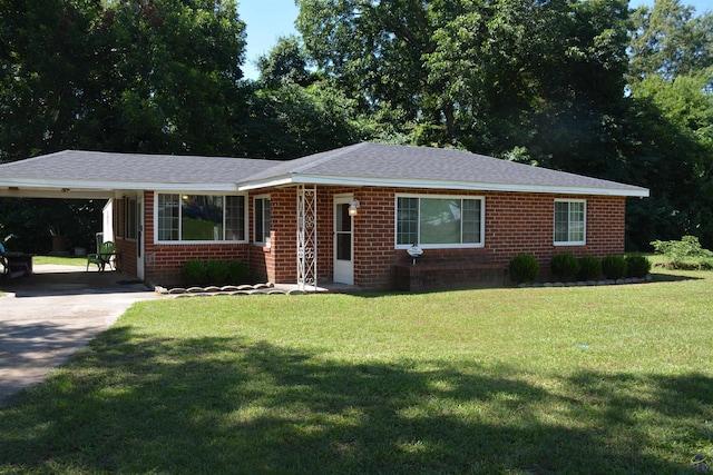 ranch-style house with a carport and a front yard