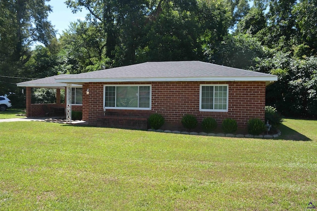 single story home with a front yard