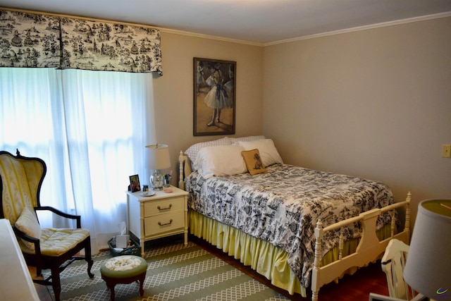 bedroom with crown molding