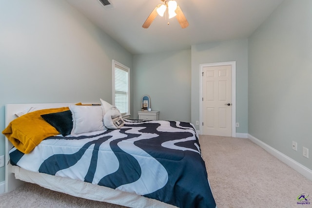 carpeted bedroom with ceiling fan