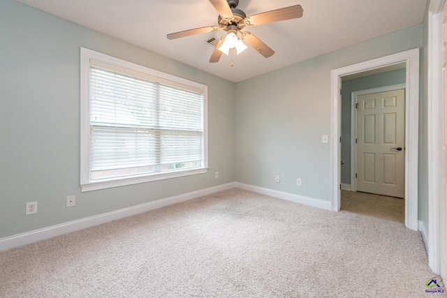 105 Dove Stone Ct, Bonaire, GA 31005 - unfurnished room featuring light carpet, baseboards, and a ceiling fan