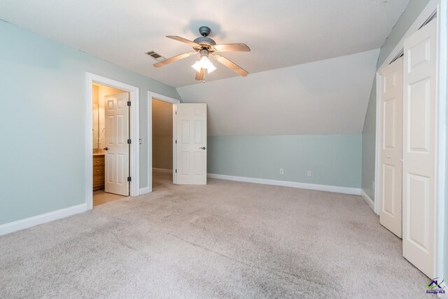 bonus room featuring ceiling fan, lofted ceiling, and light carpet