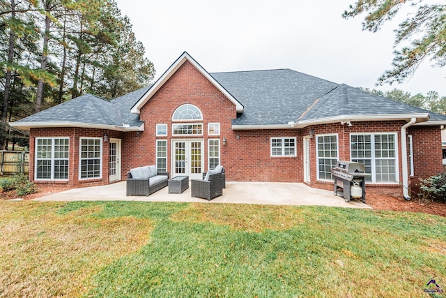 105 Dove Stone Ct, Bonaire, GA 31005 - rear view of property with roof with shingles, brick siding, a lawn, a patio area, and french doors