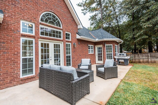 view of patio with an outdoor hangout area, french doors, and a grill