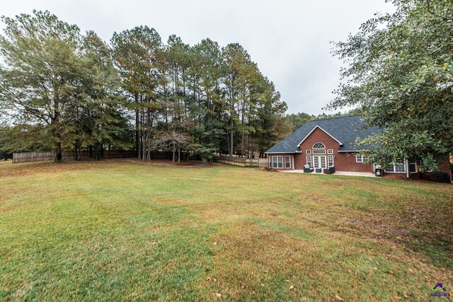 view of yard featuring french doors