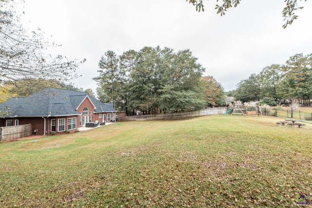 view of yard with a playground