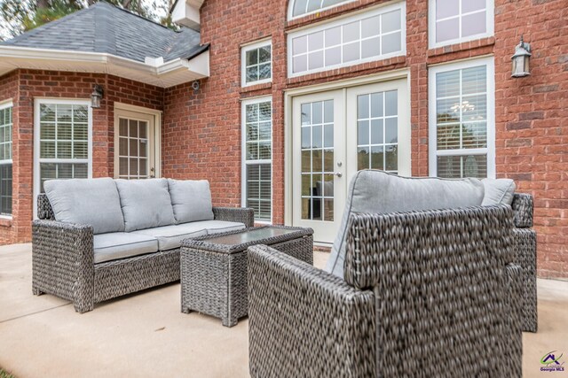 view of patio featuring an outdoor living space and french doors