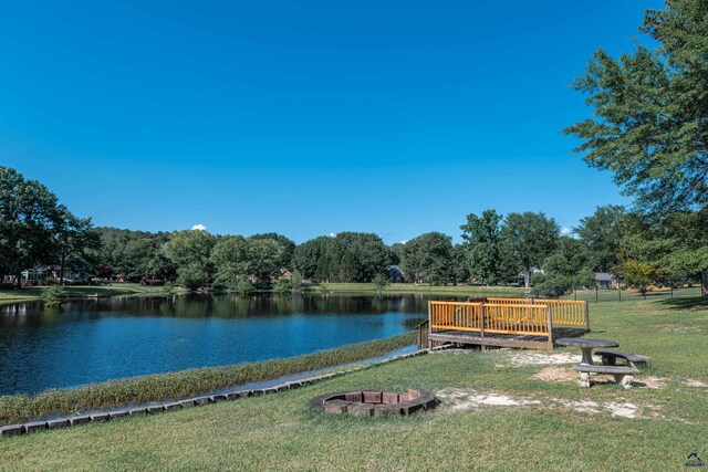 water view featuring a fire pit