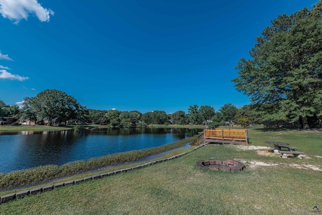 view of water feature with an outdoor fire pit