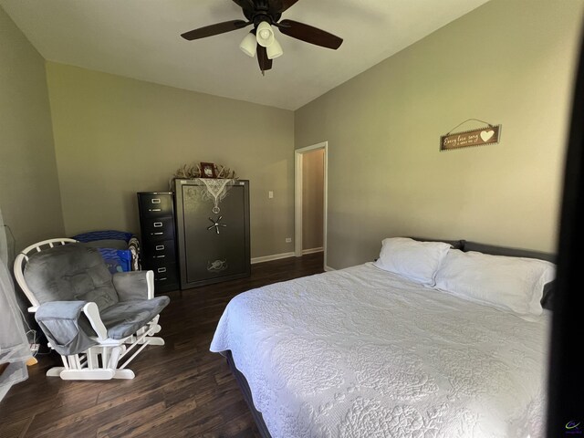 bedroom featuring dark wood-type flooring and ceiling fan