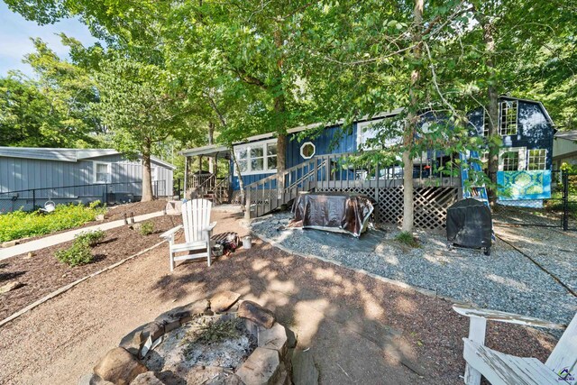 exterior space featuring a fire pit