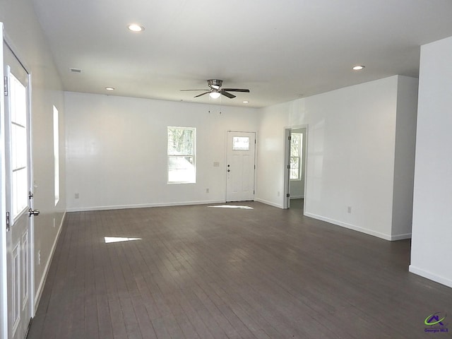 unfurnished living room with baseboards, dark wood-style flooring, a ceiling fan, and recessed lighting