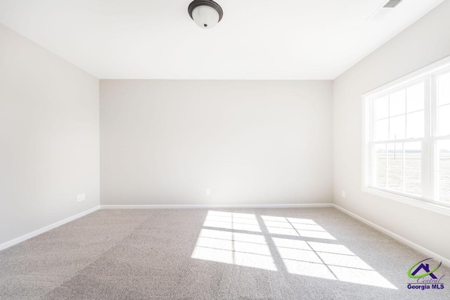 view of carpeted spare room