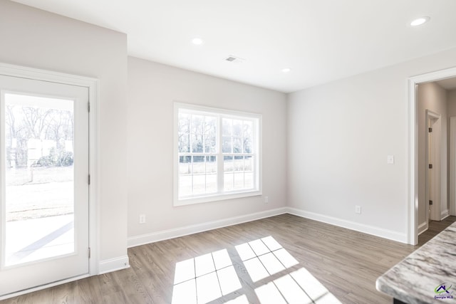 interior space with light hardwood / wood-style flooring