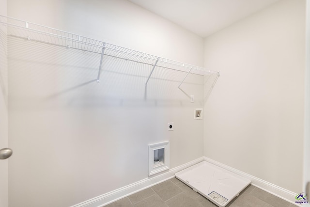 laundry room with washer hookup, tile patterned floors, and hookup for an electric dryer