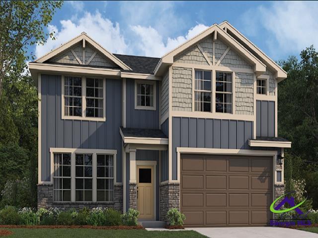 craftsman inspired home with a garage