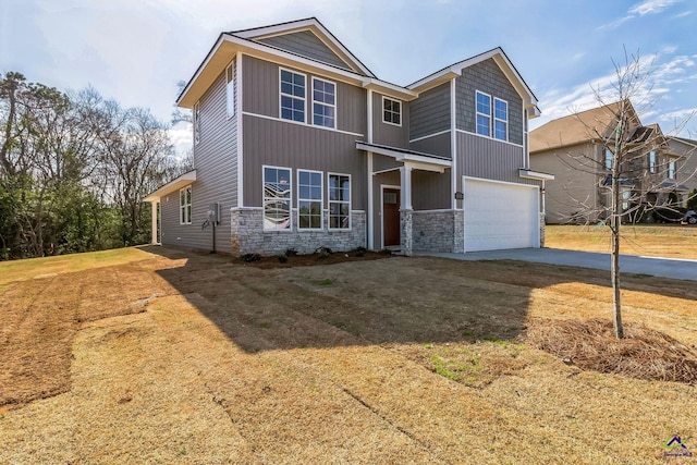 view of front facade with a garage, stone siding, and concrete driveway