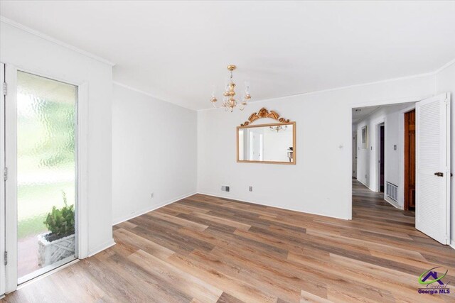 interior space with crown molding