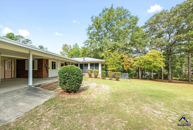 view of patio featuring a carport