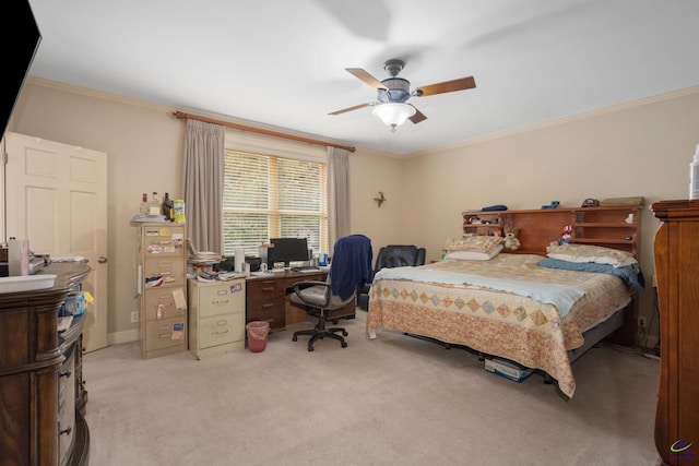 bedroom featuring ceiling fan, light carpet, and ornamental molding