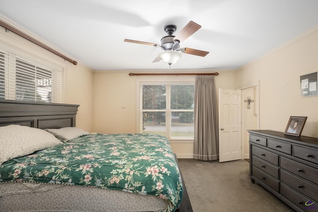 carpeted bedroom featuring crown molding, multiple windows, and ceiling fan