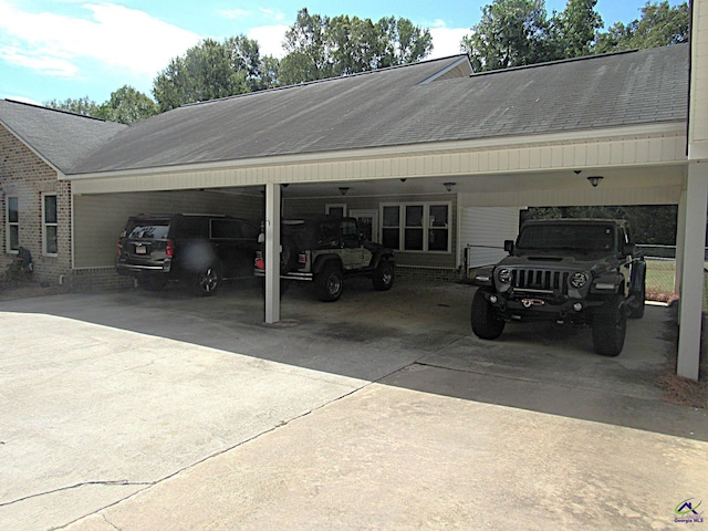 garage with a carport