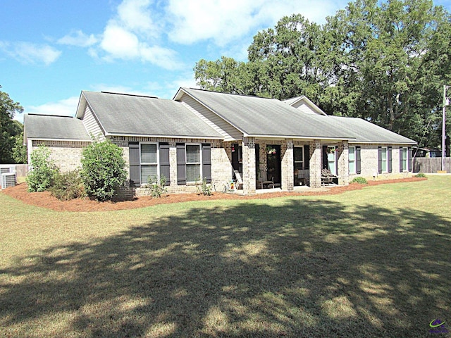 single story home with a front yard