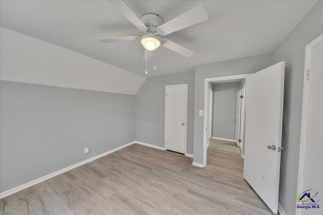 bonus room with ceiling fan, lofted ceiling, and light hardwood / wood-style flooring