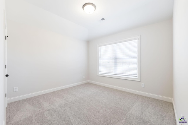 view of carpeted spare room